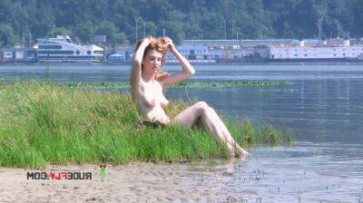 Playful blond nudist teen caught on camera naked at the beach - sunporno.com