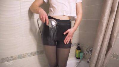 Teen Amateur In White T-shirt And Tight Pantyhose Showering In The Hotel - hotmovs.com