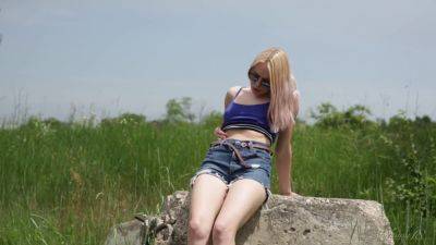 Luscious Blonde Teen Masturbates Naked on a Rock - txxx.com - Russia