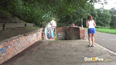 Naughty European teen relieves her water-sapping need in public by peeing in public - sexu.com - Czech Republic
