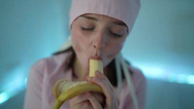 Young nurse and her banana - hclips.com