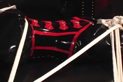 Black and red latex bondage session with restraints and rope harness - yesvids.com