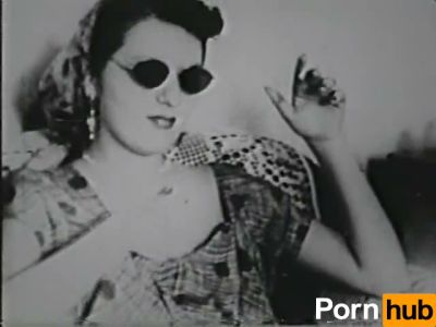 Voluptuous woman in vintage striptease seduces in black and white - yesvids.com